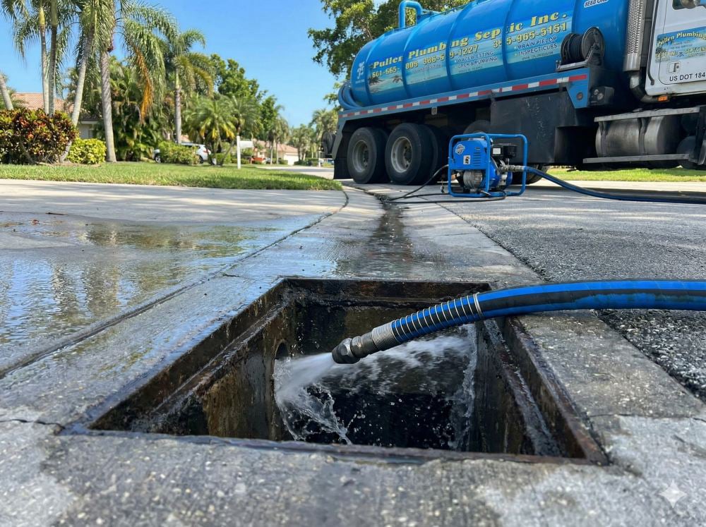 Hydro jetting hose clearing a storm drain during a drainage service call by Pulles Plumbing & Septic in West Palm Beach, FL